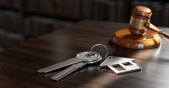Judicial Gavel and Real Estate Keys - Losing Properties Concept