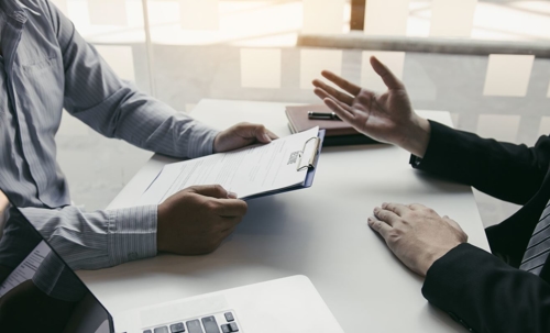 Client going over their case with an attorney